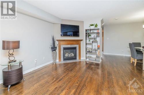 155 Challenge Crescent, Orleans, ON - Indoor Photo Showing Living Room With Fireplace