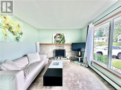 24 Snowball Crescent, Nackawic, NB - Indoor Photo Showing Living Room With Fireplace