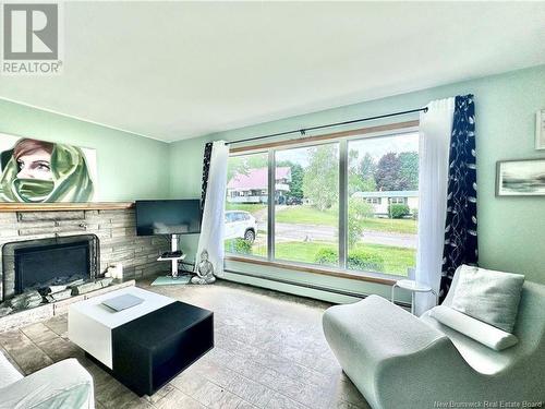 24 Snowball Crescent, Nackawic, NB - Indoor Photo Showing Living Room With Fireplace