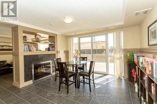 library - 1008 - 1030 Coronation Drive, London, ON - Indoor Photo Showing Dining Room With Fireplace