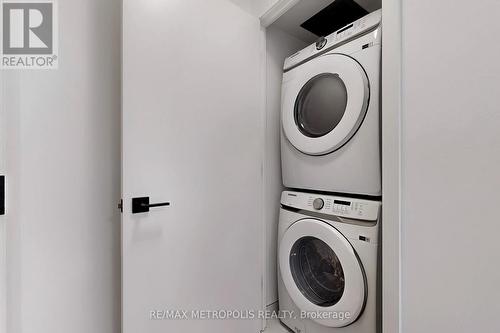 521 - 36 Zorra Street, Toronto, ON - Indoor Photo Showing Laundry Room