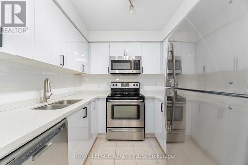 304 - 4879 Kimbermount Avenue, Mississauga, ON - Indoor Photo Showing Kitchen With Stainless Steel Kitchen With Double Sink