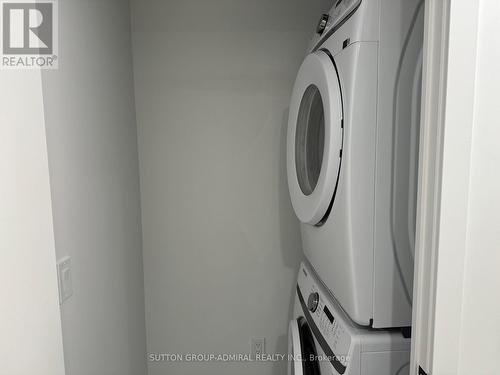 419 - 36 Zorra Street N, Toronto, ON - Indoor Photo Showing Laundry Room