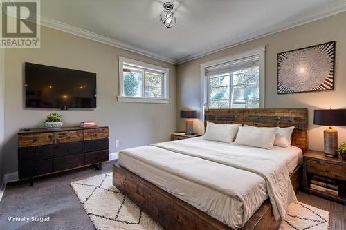 Photo has been virtually staged. - 9291 Chinook Road, Vernon, BC - Indoor Photo Showing Bedroom