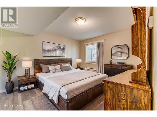 Photo has been virtually staged. - 9291 Chinook Road, Vernon, BC - Indoor Photo Showing Bedroom