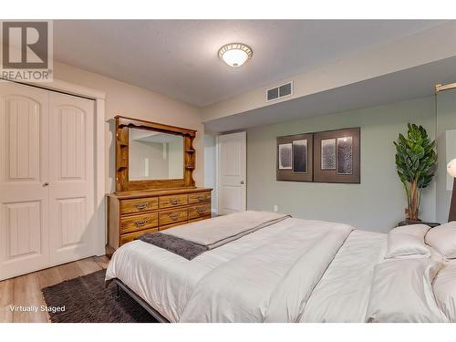 Photo has been virtually staged. - 9291 Chinook Road, Vernon, BC - Indoor Photo Showing Bedroom