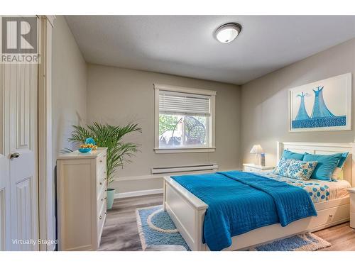 Photo has been virtually staged. - 9291 Chinook Road, Vernon, BC - Indoor Photo Showing Bedroom