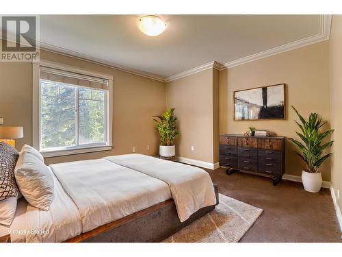 Photo has been virtually staged. - 9291 Chinook Road, Vernon, BC - Indoor Photo Showing Bedroom