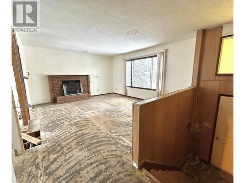 2203 Third Avenue, Rossland, BC - Indoor With Fireplace