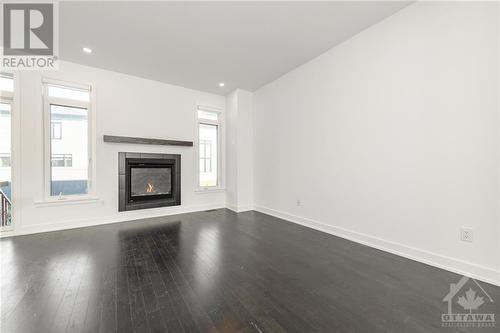 2329 Goldhawk Drive, Ottawa, ON - Indoor Photo Showing Living Room With Fireplace