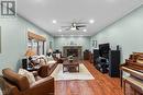 284 St. Andrews, Lakeshore, ON  - Indoor Photo Showing Living Room With Fireplace 