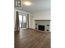 1507 5Th Street N, Cranbrook, BC  - Indoor Photo Showing Living Room With Fireplace 