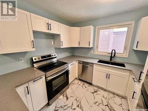 211 Broad Street, Regina, SK - Indoor Photo Showing Kitchen With Stainless Steel Kitchen With Double Sink