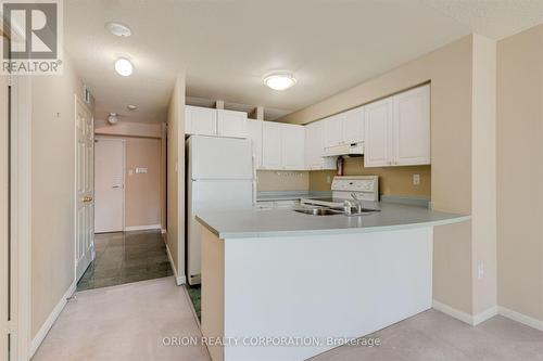 714 - 109 Front Street E, Toronto, ON - Indoor Photo Showing Kitchen