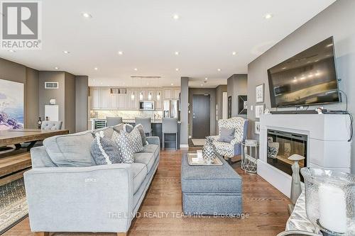 Ph 10 - 29 Northern Heights Drive, Richmond Hill, ON - Indoor Photo Showing Living Room With Fireplace