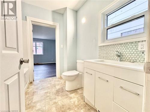 Bathroom and laundry area in main level bath room. - 1131 Cassells Street, North Bay, ON - Indoor Photo Showing Bathroom