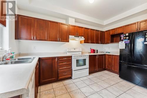 9716 Mclaughlin Road, Brampton, ON - Indoor Photo Showing Kitchen With Double Sink