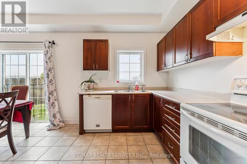 9716 Mclaughlin Road, Brampton, ON - Indoor Photo Showing Kitchen With Double Sink