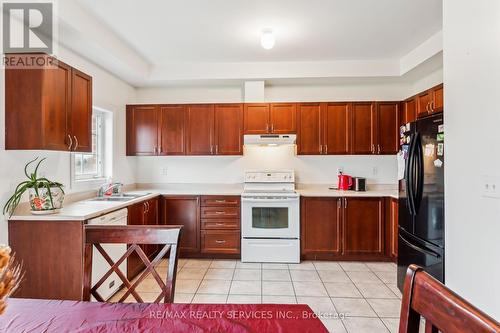 9716 Mclaughlin Road, Brampton, ON - Indoor Photo Showing Kitchen With Double Sink