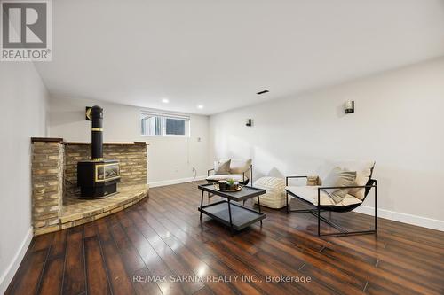 4049 Charlie Street, Petrolia, ON - Indoor Photo Showing Living Room With Fireplace