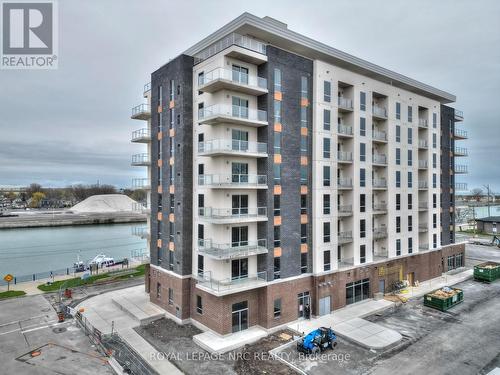 803 - 118 West Street, Port Colborne (878 - Sugarloaf), ON - Outdoor With Balcony With Facade