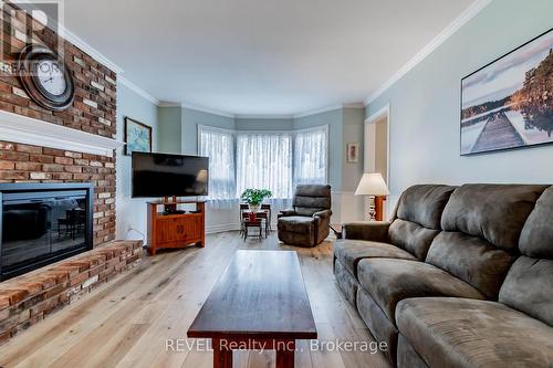 719 Church Street, Pelham (664 - Fenwick), ON - Indoor Photo Showing Living Room With Fireplace