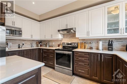 Two Tone Cupboards with Ample Storage Space in Kitchen - 379 Andalusian Crescent, Kanata (9010 - Kanata - Emerald Meadows/Trailwest), ON - Indoor Photo Showing Kitchen With Upgraded Kitchen