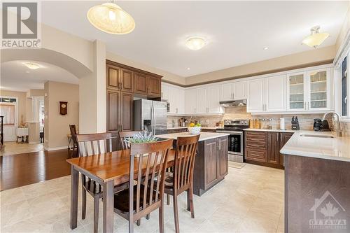 Large Kitchen with Tiled Backsplash, Pot Lights, Quartz Counters & MORE! - 379 Andalusian Crescent, Kanata (9010 - Kanata - Emerald Meadows/Trailwest), ON - Indoor