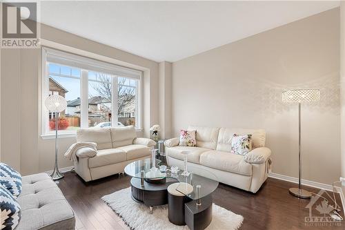 Bright Living Room in Front - 379 Andalusian Crescent, Kanata (9010 - Kanata - Emerald Meadows/Trailwest), ON - Indoor Photo Showing Living Room