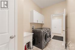 Full Laundry Room & Upgraded Mud Room from Garage - 