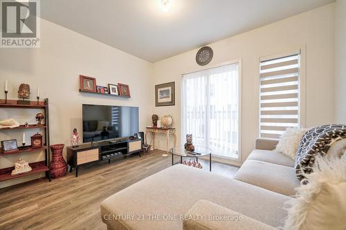 94 Bartley Drive, Toronto, ON - Indoor Photo Showing Living Room