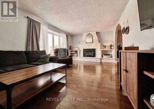 1207 Ferguson Road, Timmins (Porcupine - West), ON - Indoor Photo Showing Living Room With Fireplace