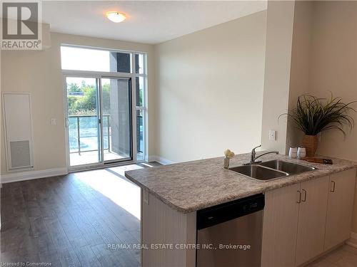 226 - 16 Concord Place, Grimsby, ON - Indoor Photo Showing Kitchen With Double Sink