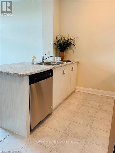 226 - 16 Concord Place, Grimsby, ON - Indoor Photo Showing Kitchen With Double Sink