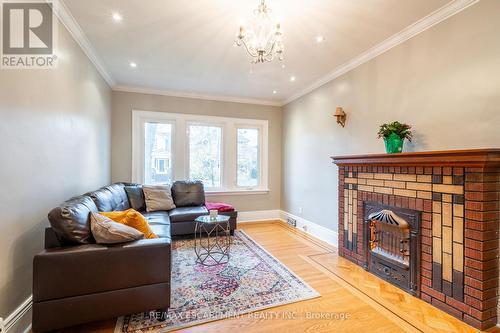 53 Tuxedo Avenue S, Hamilton, ON - Indoor Photo Showing Living Room With Fireplace