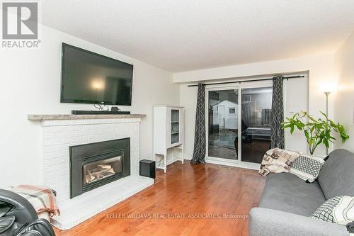 243 Highview Drive, Kitchener, ON - Indoor Photo Showing Living Room With Fireplace