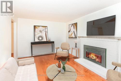 243 Highview Drive, Kitchener, ON - Indoor Photo Showing Living Room With Fireplace