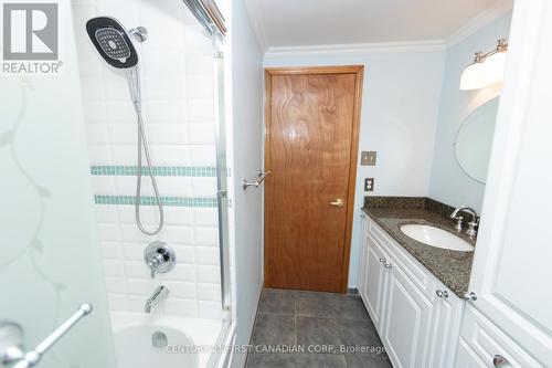 Tiled Shower with sliding glass doors - 2 Sauve Avenue, St. Thomas, ON - Indoor Photo Showing Bathroom