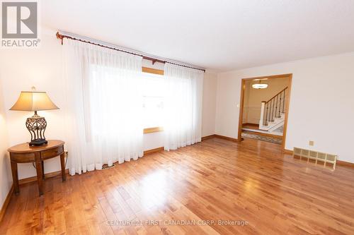 Living room with large bay window - 2 Sauve Avenue, St. Thomas, ON - Indoor Photo Showing Other Room