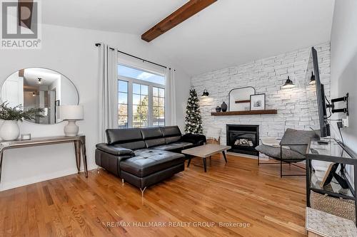 1589 Rumford Drive, Ottawa, ON - Indoor Photo Showing Living Room With Fireplace