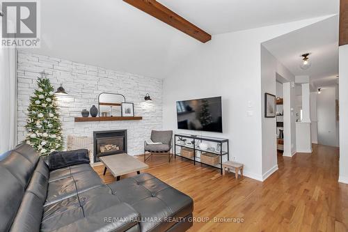 1589 Rumford Drive, Ottawa, ON - Indoor Photo Showing Living Room With Fireplace