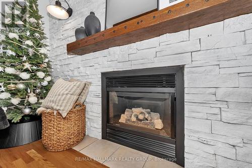 1589 Rumford Drive, Ottawa, ON - Indoor Photo Showing Living Room With Fireplace