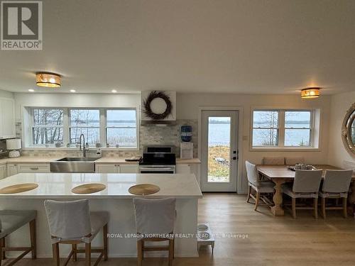 767 Leclair Avenue, Timmins, ON - Indoor Photo Showing Dining Room With Fireplace