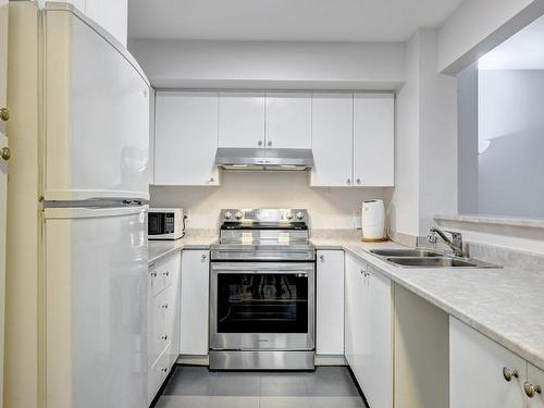 Kitchen - 201-6840 Av. Fielding, Montréal (Côte-Des-Neiges/Notre-Dame-De-Grâce), QC - Indoor Photo Showing Kitchen With Double Sink