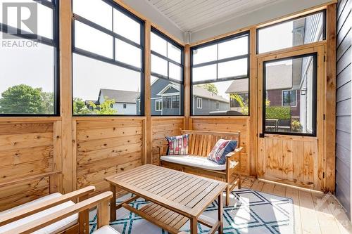 Relaxing sunroom for lounging and has door to upper deck - 11 New Haven Gate, Westport, ON - Indoor Photo Showing Other Room