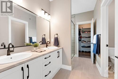 Spa ensuite with two-sink vanity and separate water closet - 11 New Haven Gate, Westport, ON - Indoor Photo Showing Bathroom