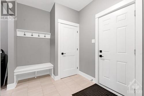 Mudroom closet and built-in bench - 11 New Haven Gate, Westport, ON - Indoor Photo Showing Other Room