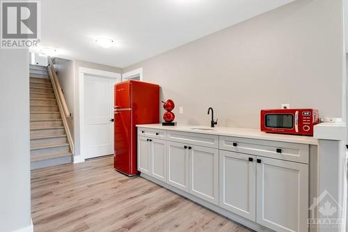 Lower level potential for in-law suite, with kitchenette, living space, bedrooms and bathroom. - 11 New Haven Gate, Westport, ON - Indoor