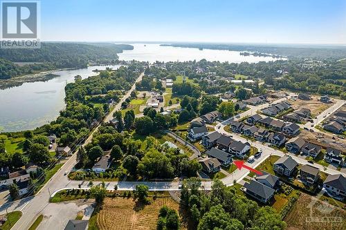 In desirable Westport's Watercolour neighbourhood of sustainability and homes net-zero ready, surrounded by Rideau Lake parks & boat launches - 11 New Haven Gate, Westport, ON - Outdoor With Body Of Water With View