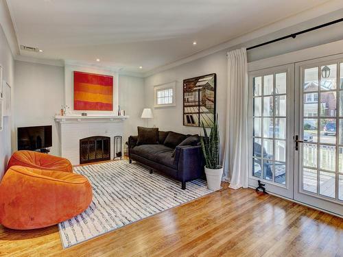 Living room - 128 Av. Balfour, Mont-Royal, QC - Indoor Photo Showing Living Room With Fireplace